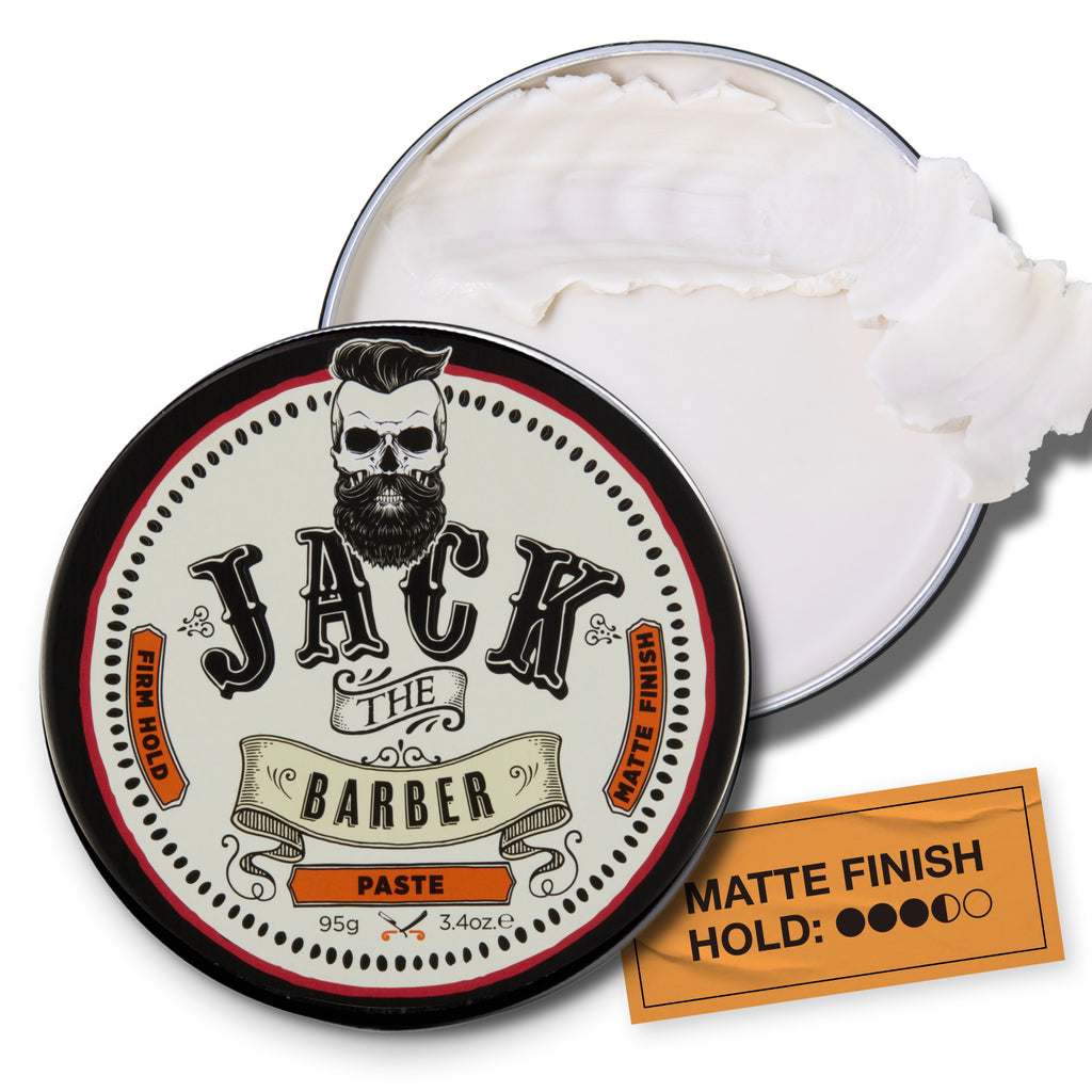 Jack the Barber paste with open lid showing white paste inside on a white background